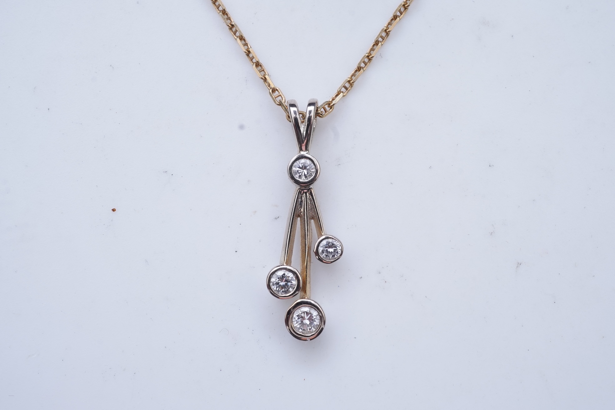 A diamond pendant necklace